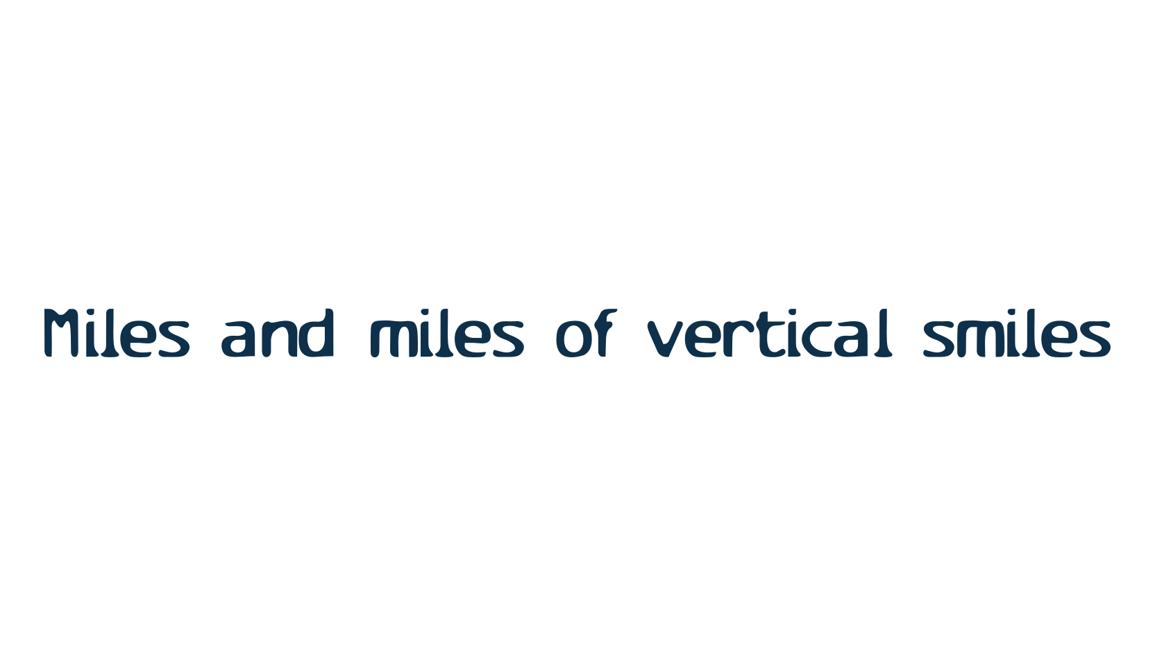 Miles and miles of vertical smiles, fancy eroded decorative font preview